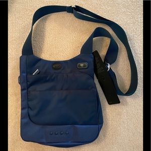 Tumi T-Tech small lightweight messenger bag.